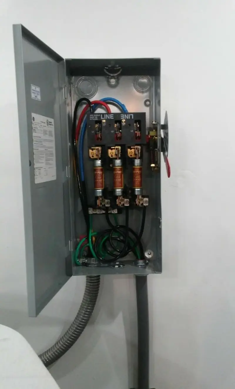 Three-phase disconnect switch installed for Smoke Detector Installation in Scott